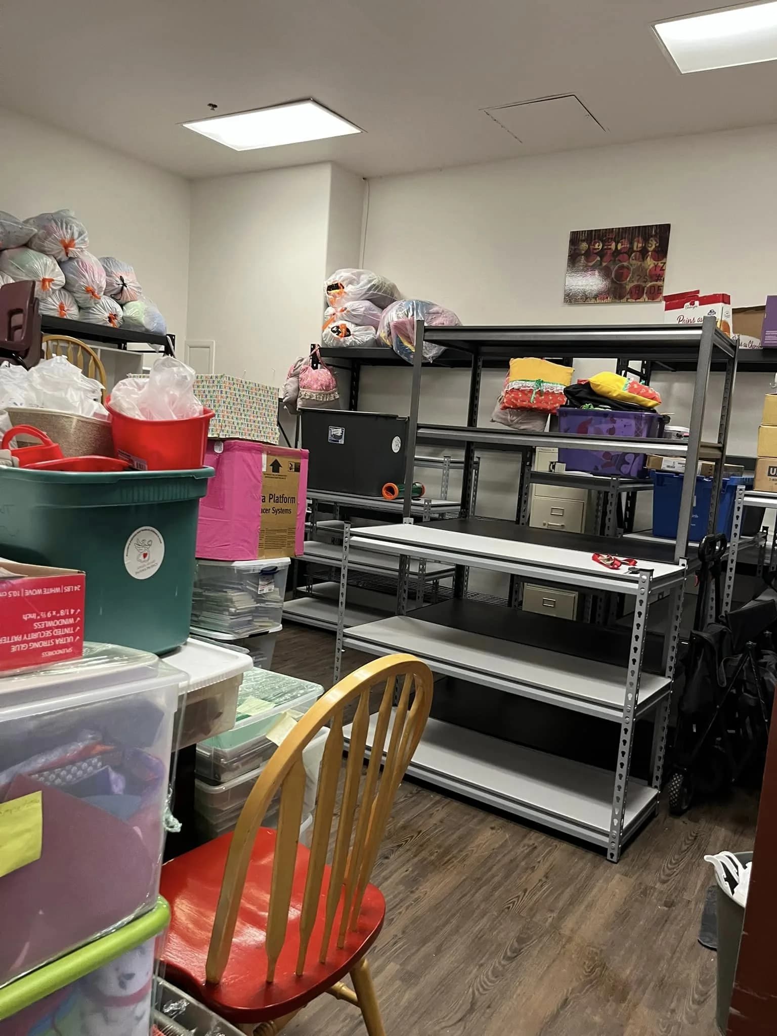 A team of volunteers organizing donated pajamas by size